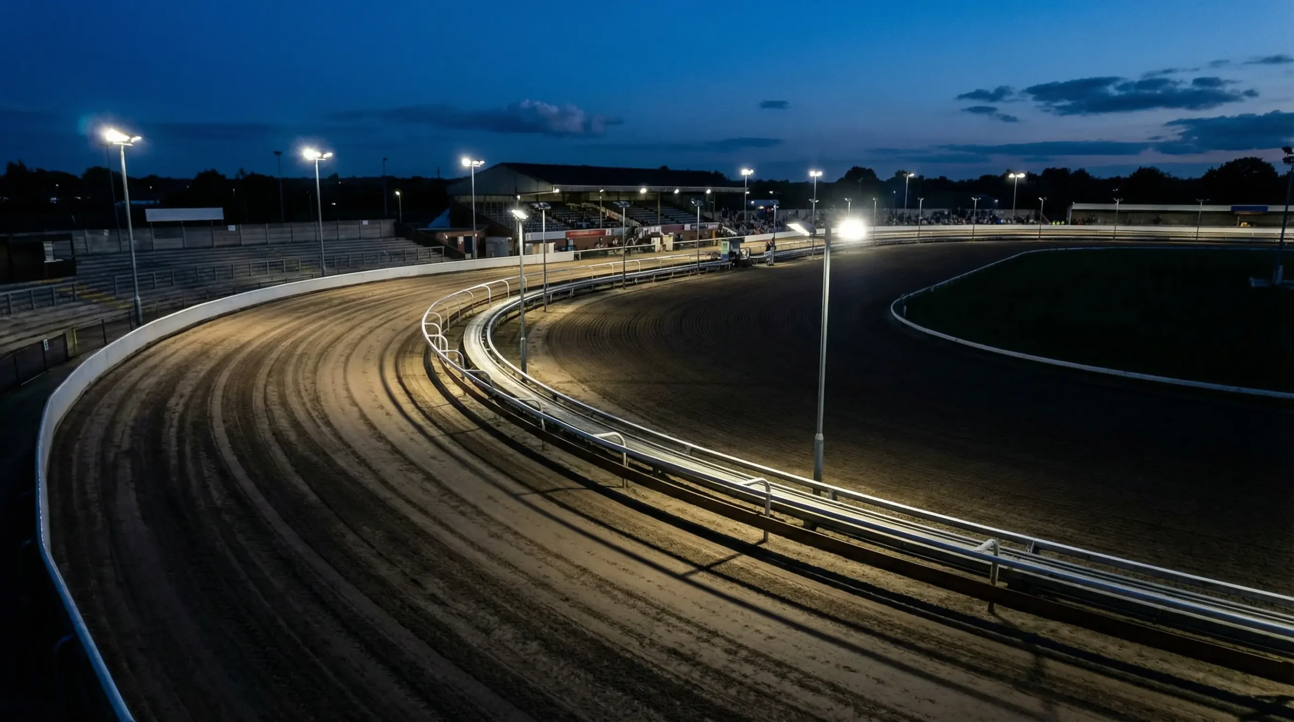 UK greyhound racing track layout showing bend configuration and trap bias